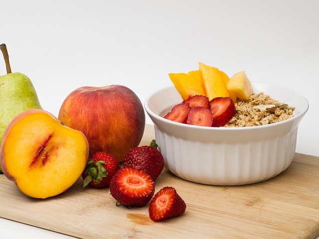 Sliced peaches in granola and yogurt. For a snack or breakfast. Pear are good, too.